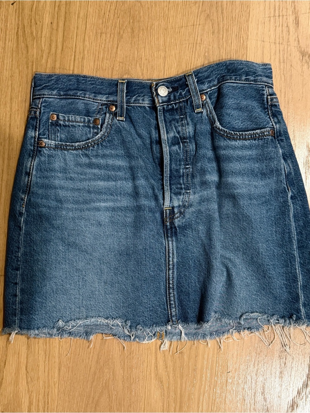 Levi's Medium Wash Frayed Hem Denim Mini Skirt